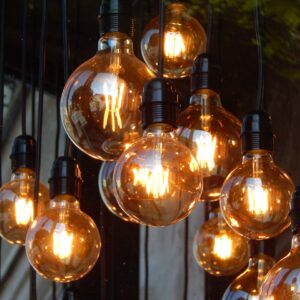 Home A captivating close-up of glowing vintage Edison light bulbs, creating a warm ambiance.